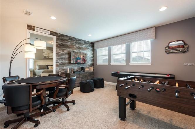 Vacation Home For Sale in Encore at Reunion - 6 BR Pool Home Fully Furnished - Kissimmee $499,000