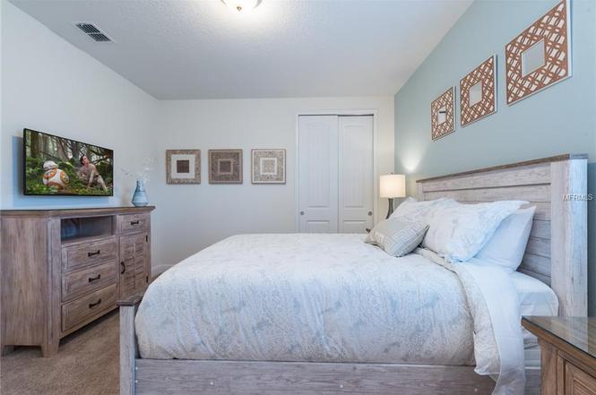 Vacation Home For Sale in Encore at Reunion - 6 BR Pool Home Fully Furnished - Kissimmee $499,000