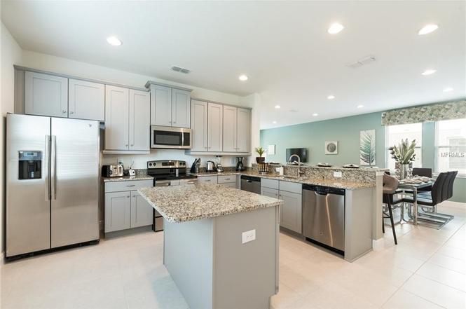 Vacation Home For Sale in Encore at Reunion - 6 BR Pool Home Fully Furnished - Kissimmee $499,000